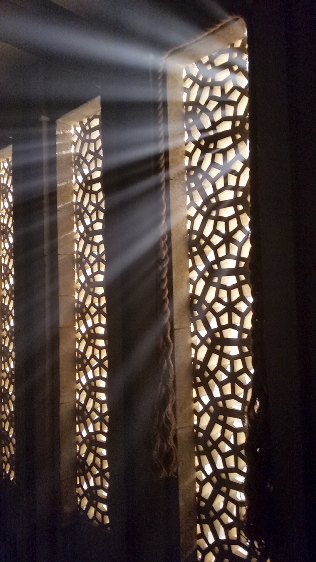 Light streaming through lattice wall, Richmond, British Columbia, Canada