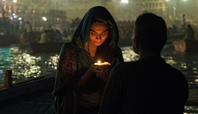 Woman and Candle, Ganga (Ganges) River, Varanasi, Uttar Pradesh, India