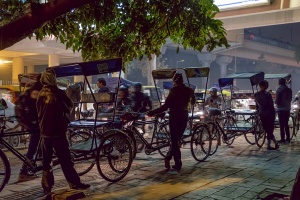 Waiting, Bicycle Rickshaw Line, Lajpat Nagar Metro Station, New Delhi, India