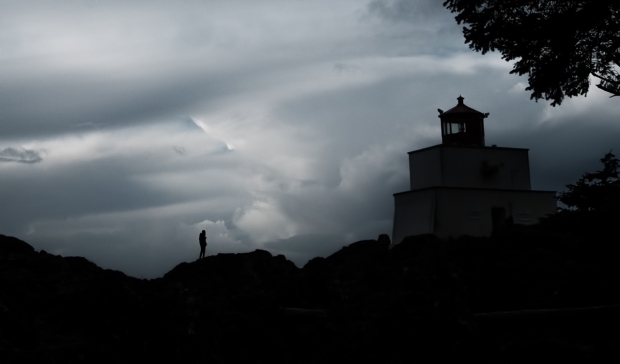 Silhouetto of a Man, Amphitrite Lighthouse, Wild Pacific Trail, Ucluelet, Vancouver Island, British Columbia, Canada