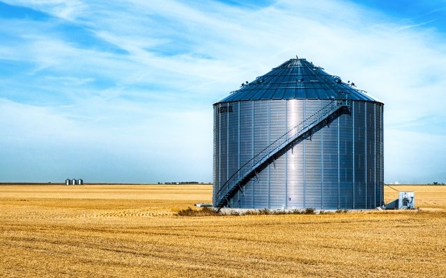 Grain Bin in Harvested Field, Pitman, Saskatchewan, Canada